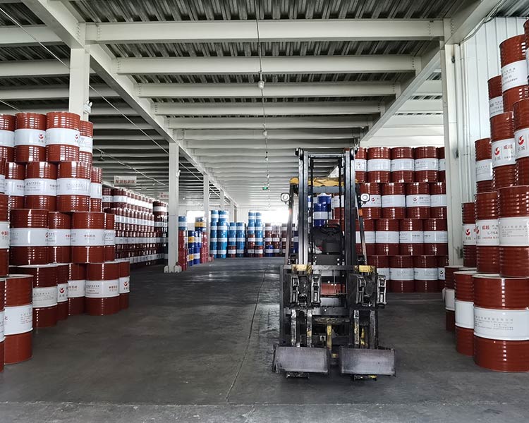 Base oil drums at an industrial storage facility